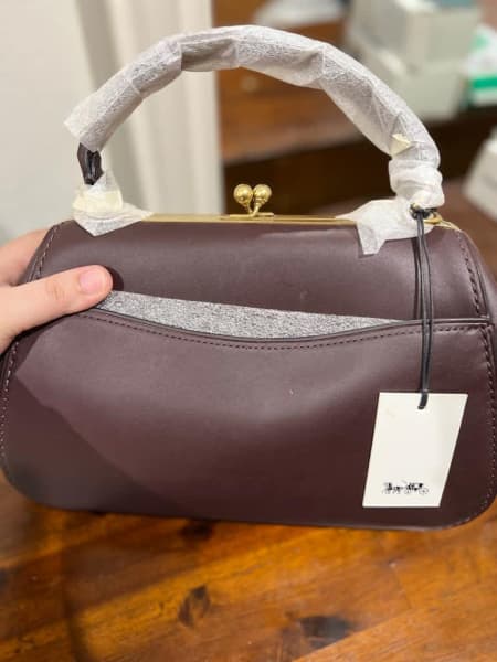 Coach F29209 Zip Shoulder Bag in Brown Signature Coated Canvas with Pink  Smooth Leather Details - Women's Hobo Bag