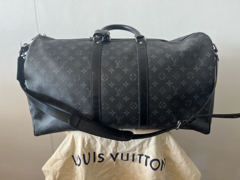 louis vuitton bandouliere keepall 55 w lv lock / key luggage tag