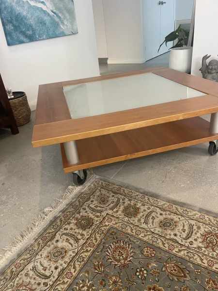Timber and glass coffee tables on removable wheels 62863383291649112
