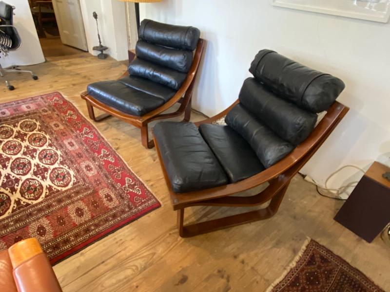Two Tessa T4 Mid Century leather chairs and ottoman62863374284801111