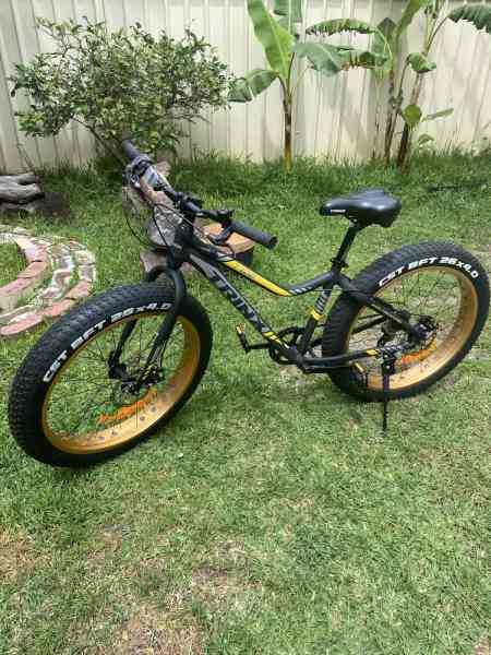Trinx Tiger T106 Fat Bike Shimano 7 Speed Bicycle Matt Black Orange