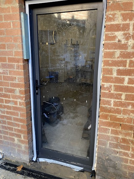 New Aluminium and glass swinging door.63440164613378110
