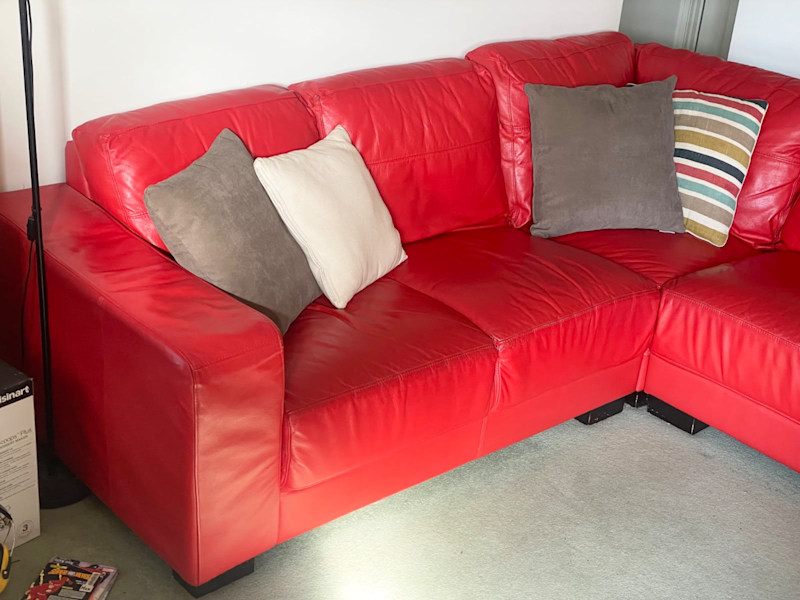 Red leather modular lounge suite62863408393474112