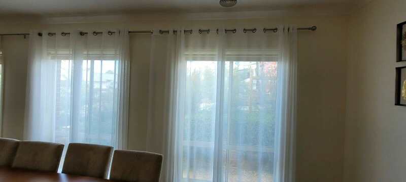 how to cover 3 windows with curtains