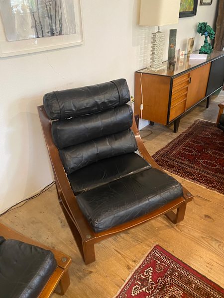 Two Tessa T4 Mid Century leather chairs and ottoman62863374284801112