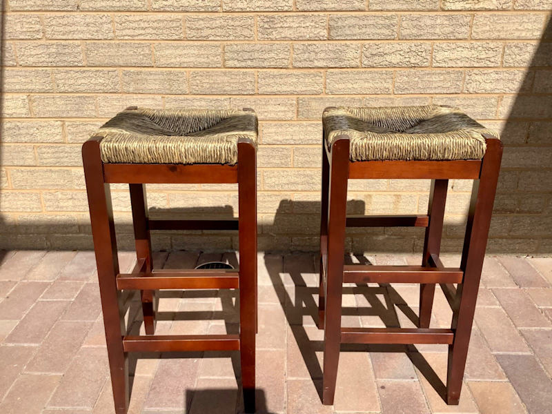 Two bar stools with rush seats, $40 for both.628638390351381113