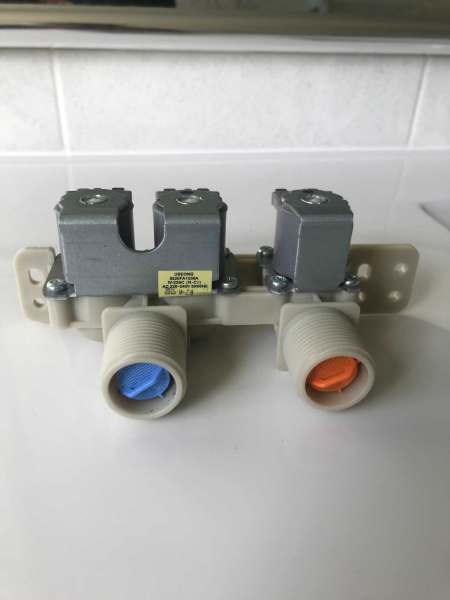 LG top loader washing machine PART. Part is dual inlet valve.63021282210690113