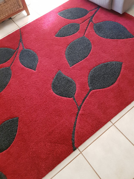 Red and black floor rug63012444779139112