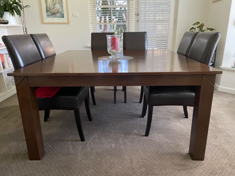 second hand dining table and 8 chairs