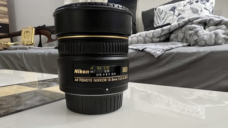 nikon lens cleaning service cost