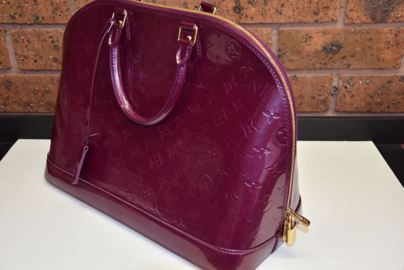 Authentic louis vuitton handbag Alma BB Amethyst. Perfect condition!  Carried 2X.