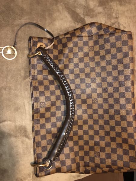 LOUIS VUITTON MONOGRAM VANITY CASE, with leather trims, shoulder strap and  name tag, gold tone hardware, push lock closure, inside a mirror, two  pockets and a leather strap, 32cm x 22cm H
