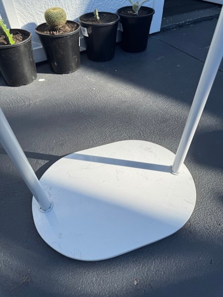Clothes rack with marble like bottom62863406676739112