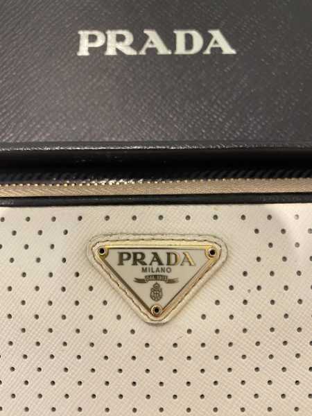 SOLD* Prada Portafoglio Tracolla Clutch/Wallet  Prada clutch, Wallet on a  chain, Prada wallet
