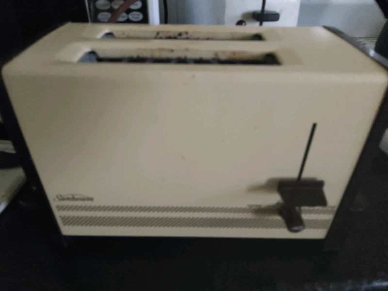 NO HOLDS .Old school toaster -works but goes slowly - reliable ppl ony63013350918658111