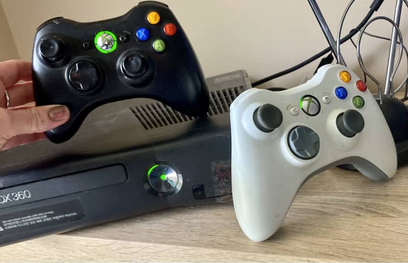 xbox 360 with two controllers and kinect