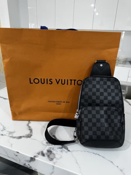 Louis Vuitton rolling luggage ( 2 wheels) - huge - Depop
