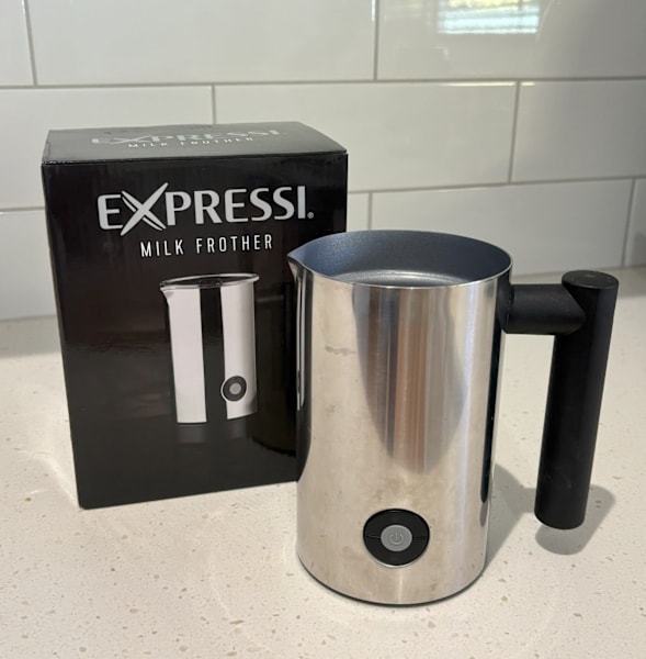 Nespresso Expressi coffee pod machine, milk frother, capsule dispener63018620096387114