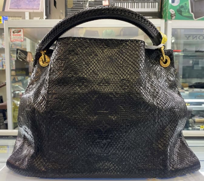 Artsy python handbag