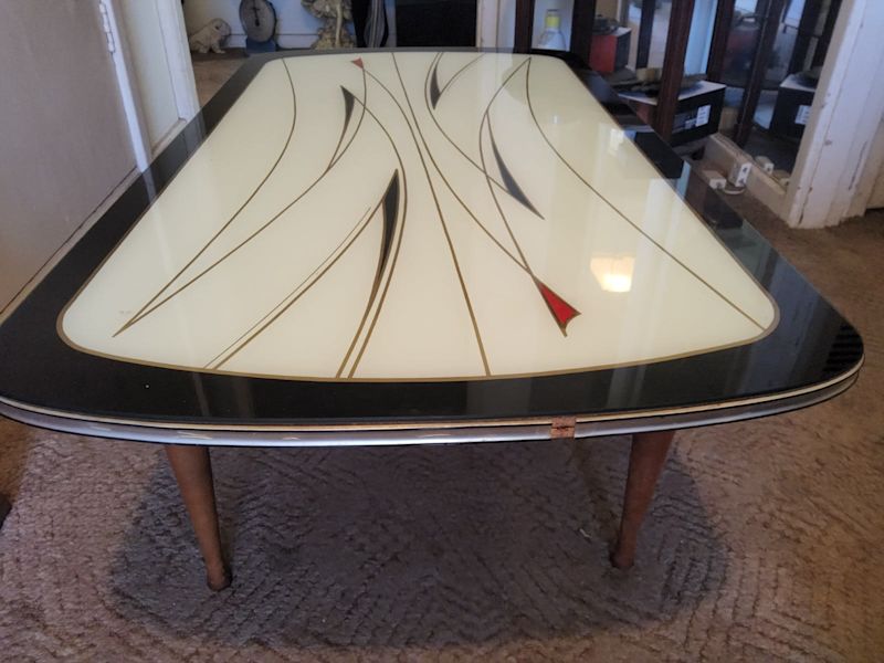 1970s glass top coffee table62863377034242112