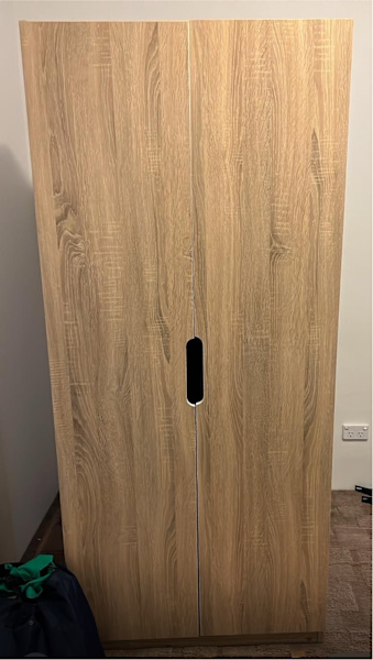 Wardrobe - near new beige 2 door biege wardrobe$101628633844468511114