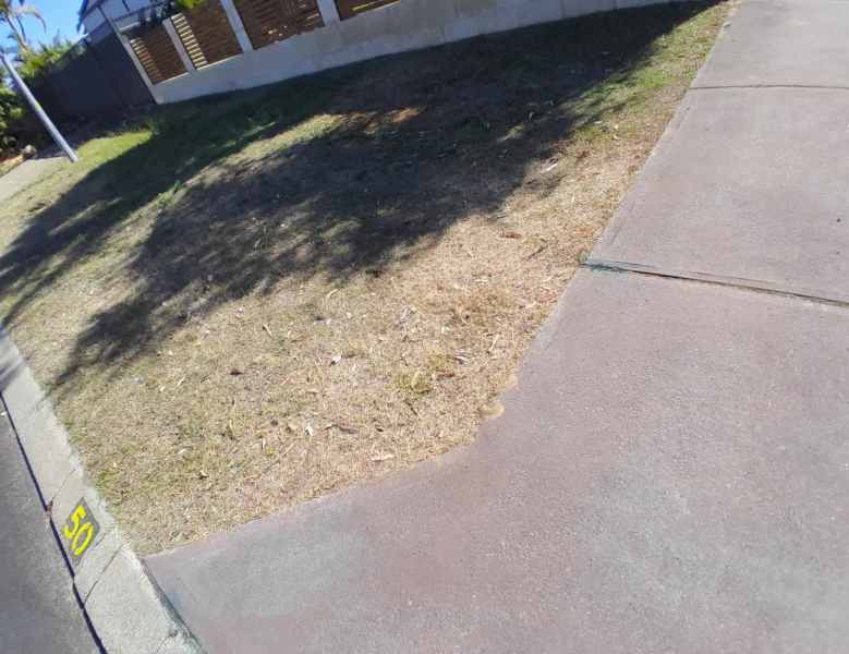 wanted grass removed and put down gravel 62863396254209116