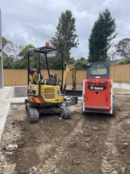 Mini excavator and operator 62863416697986111