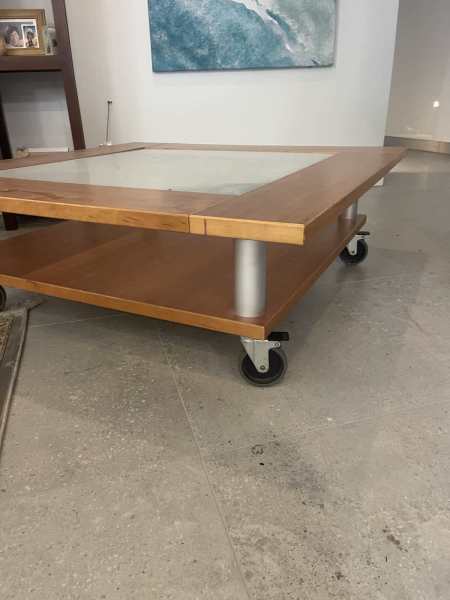Timber and glass coffee tables on removable wheels 62863383291649111