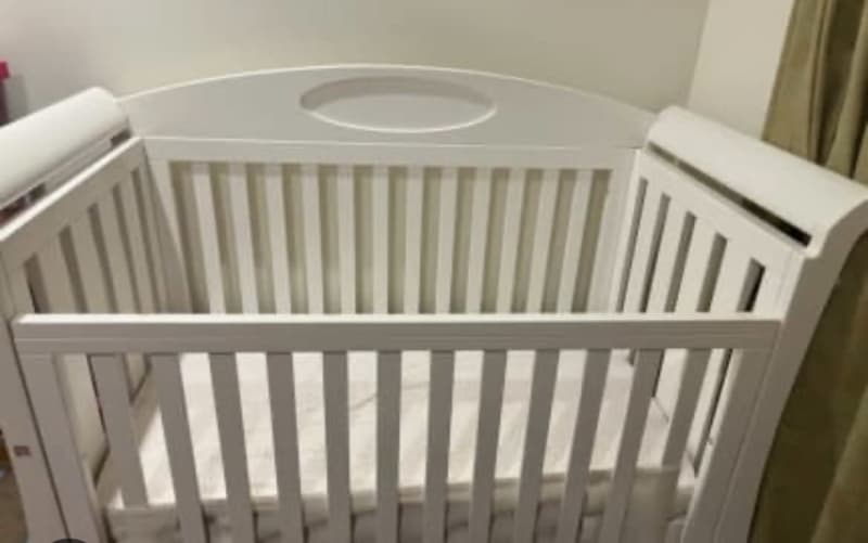 Elite love n care cot sale