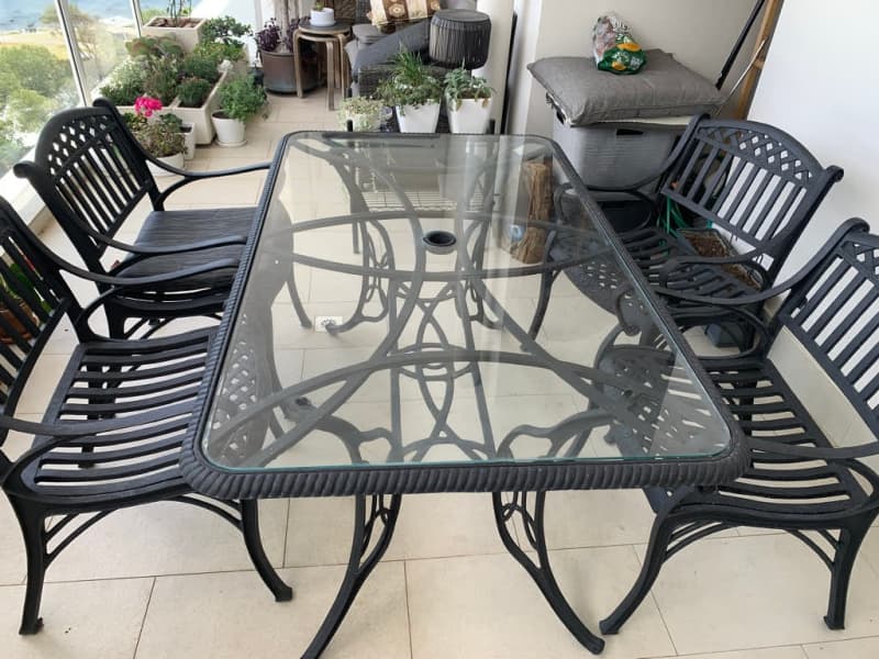 metal and glass outdoor dining table