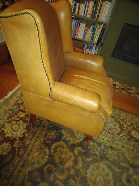 Pair of stunning wingback leather arm chairs62865821239811114