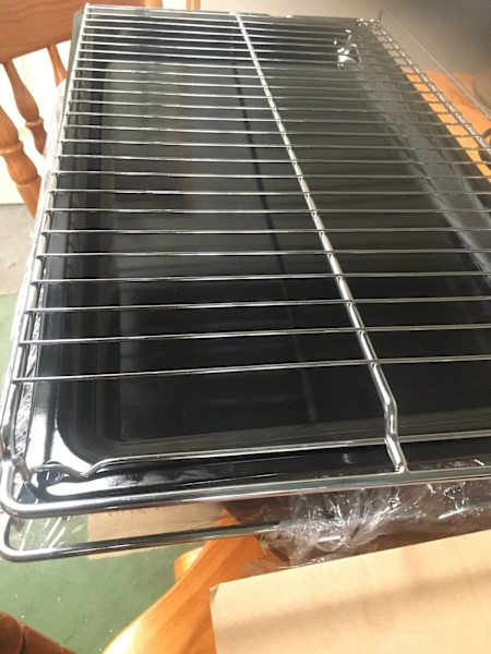 Stainless steel rack and oven tray brand new.63442571361794110