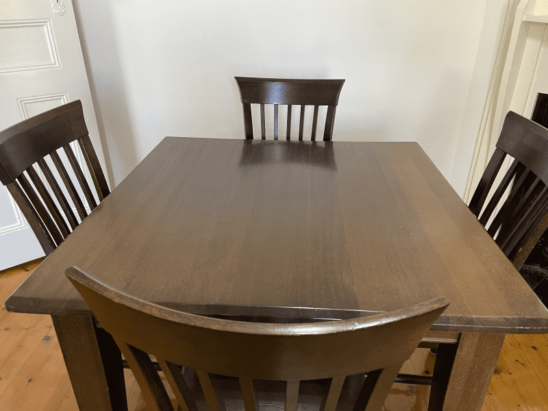 dark wood table and 4 chairs