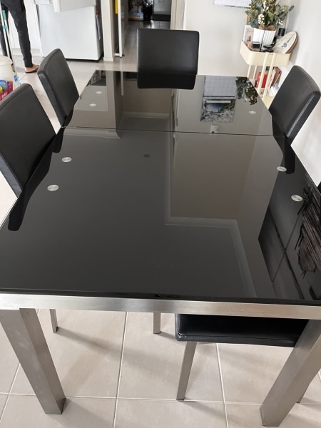 smoked glass extendable dining table