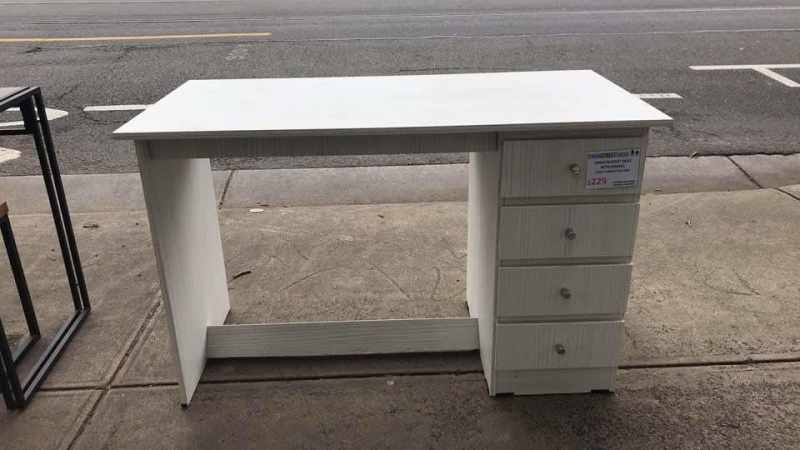 assembled desk with drawers