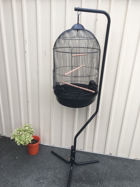 white round bird cage with stand