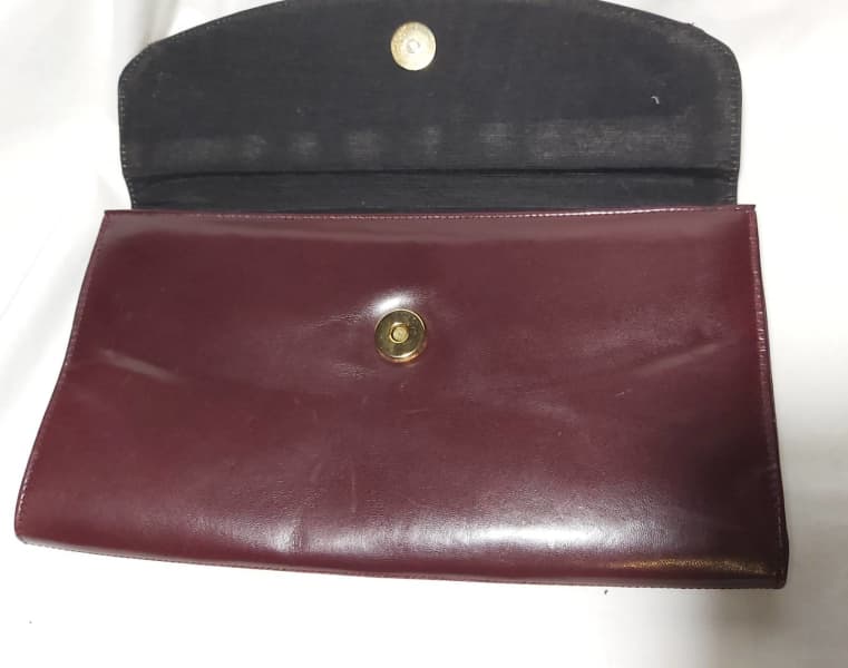 Leather clutch bag Bally Burgundy in Leather - 22338649