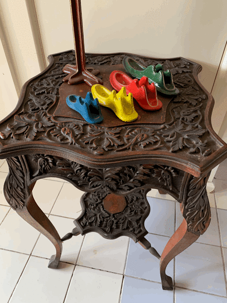 CARVED side table from South Africa.62865820974465111