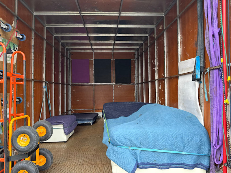 2 men and truck with different size fleet 63008481451777114