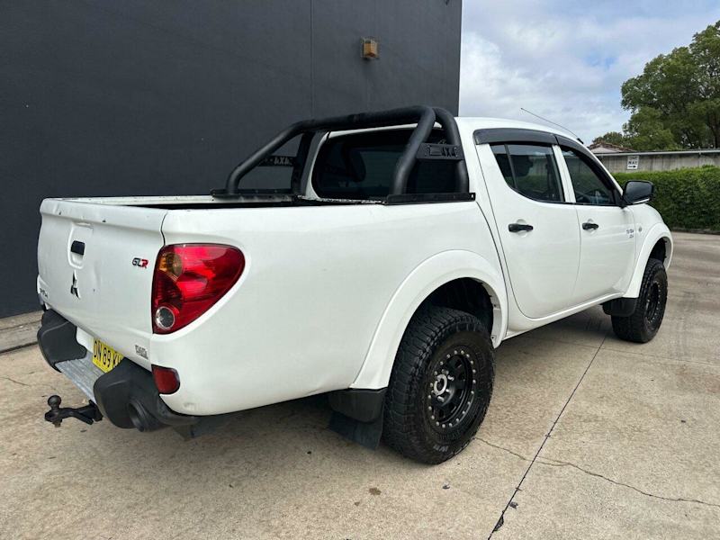 2011 Mitsubishi Triton MN MY11 GL-R Double Cab White 5 Speed Manual Utility62934704324355112