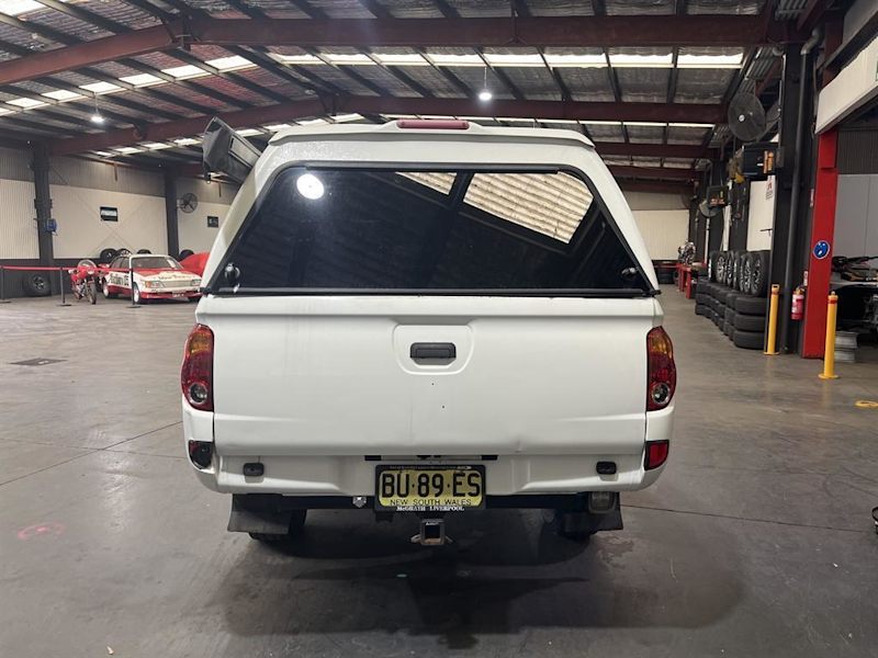 2012 Mitsubishi Triton MN MY13 GLX (4x4) White 5 Speed Manual Club Cab Utility62936663766657113