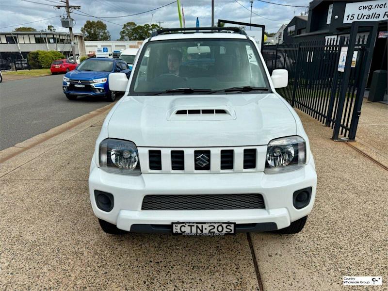 2013 Suzuki Jimny Sierra (4x4) White 5 Speed Manual 4x4 Wagon62934694789763111