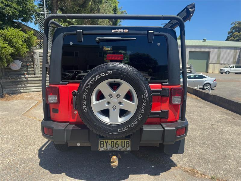 2013 Jeep Wrangler Unlimited JK MY13 Sport (4x4) Red 6 Speed Manual Softtop62937625654274113