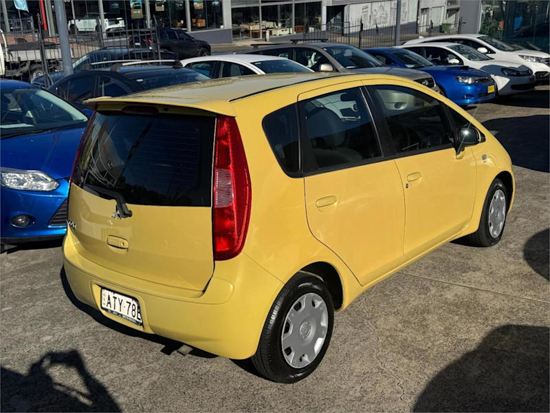 2005 Mitsubishi Colt RG LS Yellow Continuous Variable Hatchback62934704116225111