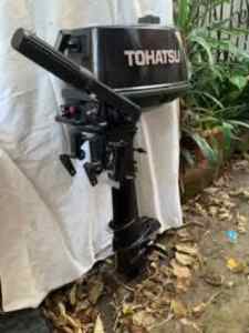 Toshiba 5 hp outboard with extra 12 ltr tank