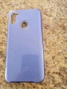 Samsung a11 phone cover in like. New cond. As only 2 months old