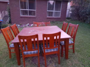 Free 8 seater solid timer table and 8 chairs