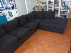 Two piece 6/7 seater lounge with pull out bed