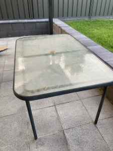 Glass outdoor table and 6 chairs