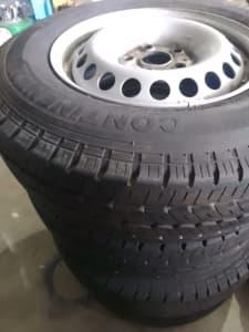 4 continental tires on rim. Excellent condition 